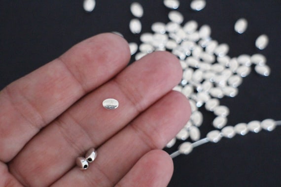 30 perles ovales en métal argenté lisses fines et délicates 6 x 4 mm