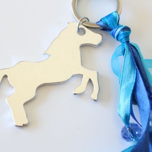 Handmade blue and silver horse bag charm