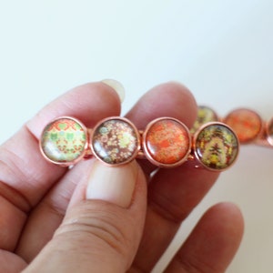 2 Handmade multi-colored and rose gold barrettes