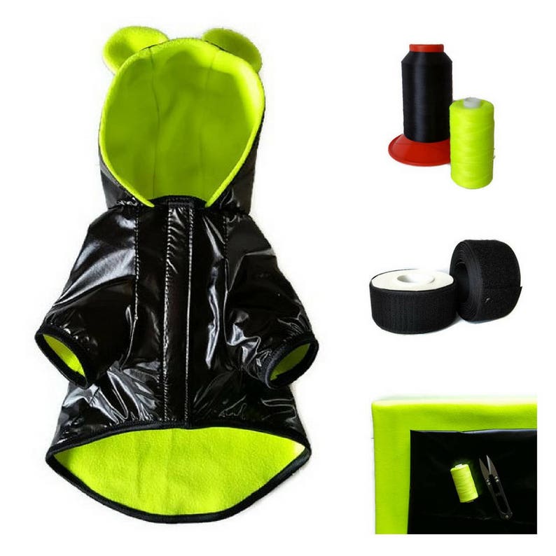 Puede incluir: Chubasquero negro brillante para perro con forro de polar verde ne&oacute;n y capucha. El chubasquero tiene solapas en forma de orejas en la capucha. La imagen tambi&eacute;n muestra hilo negro, cinta de velcro negra e hilo verde ne&oacute;n.
