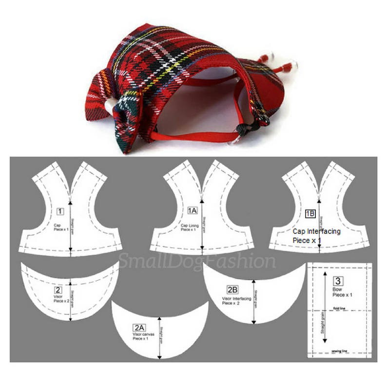 Puede incluir: Un patr&oacute;n de costura para una gorra de perro con tela de cuadros rojos y negros. El patr&oacute;n incluye piezas para la gorra, la visera y el lazo. El patr&oacute;n est&aacute; etiquetado con n&uacute;meros y letras para facilitar la identificaci&oacute;n.