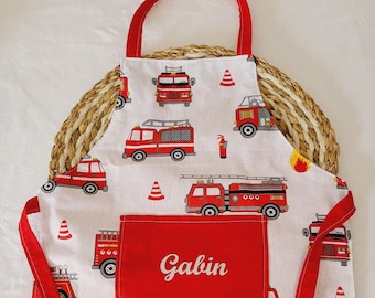 Customizable children's apron with fire truck patterns