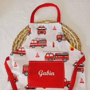 Customizable children's apron with fire truck patterns