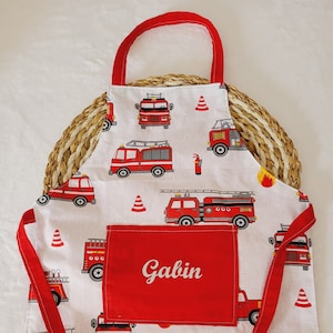 Customizable children's apron with fire truck patterns Oui en argenté