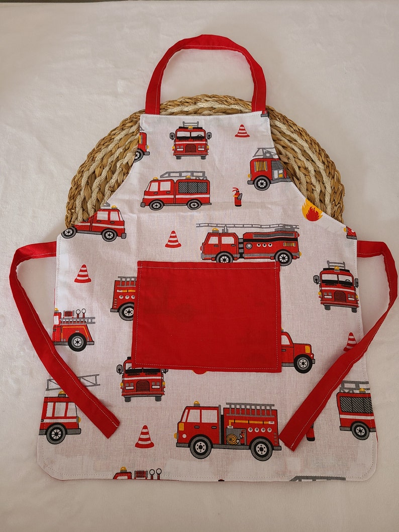 Customizable children's apron with fire truck patterns Non