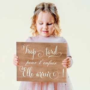 Wedding ceremony sign - "Too late to run away, she's coming"