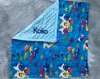 Baby shark with Minky fabric. 20X20 weighted and none weighted. Baby lovey,autism, anxiety,calming, Childs security blanket.Free embroidery.