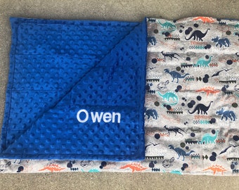 Dinosaurs with minky backing weighted/ none weighted 35X40 and 40X60. Childs blanket.sensory blanket,anxiety,calming,autism. Free embroidery