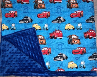 Cars with Minky fabric. 35X40 and 40X60 weighted and none weighted blankets.Childs blanket, Sensory blanket,Autism. Free embroidery.