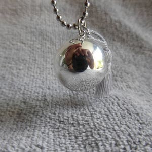 Smooth silver maternity bola, with a gray silk pompom and a star, as a long necklace image 6