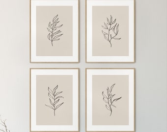 May include: Four framed prints with a minimalist line drawing of a branch with leaves on a beige background. The prints are arranged in a grid pattern on a white wall.