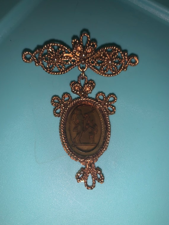 Laurentian Cupid Cameo Brooch Amber Colored Glass