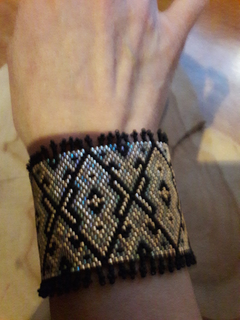 Ethnic adornment in Miyuki delicas weaving.