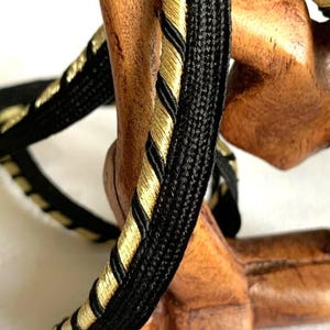 Dépassant, ruban passepoil, 9 mm de large, ruban noir et lurex or sur cordelette, en polyester, décoration, finition, vente par 2 mètres