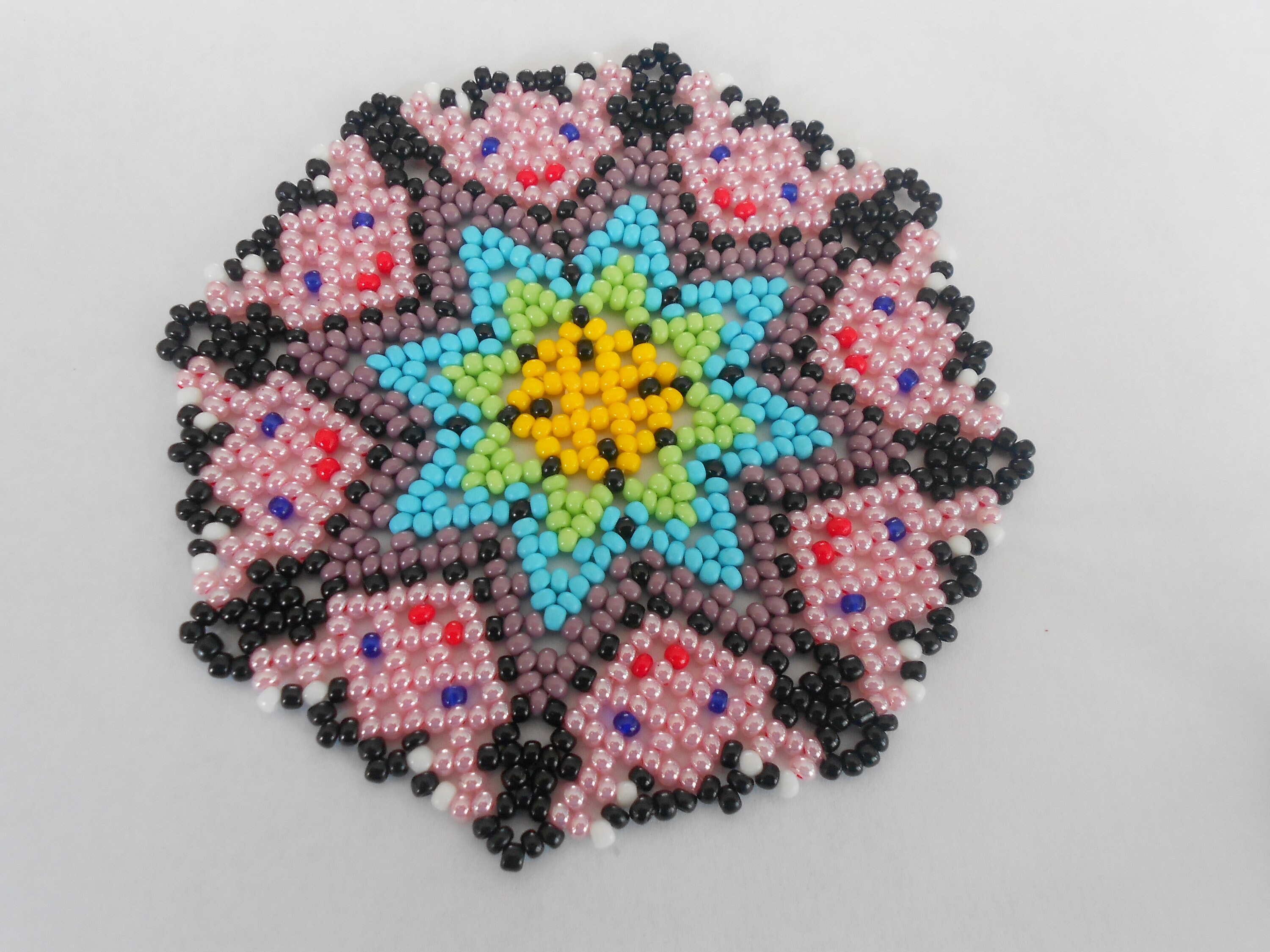 Napperon Étoile et Tête en Perles de Rocailles N 1.