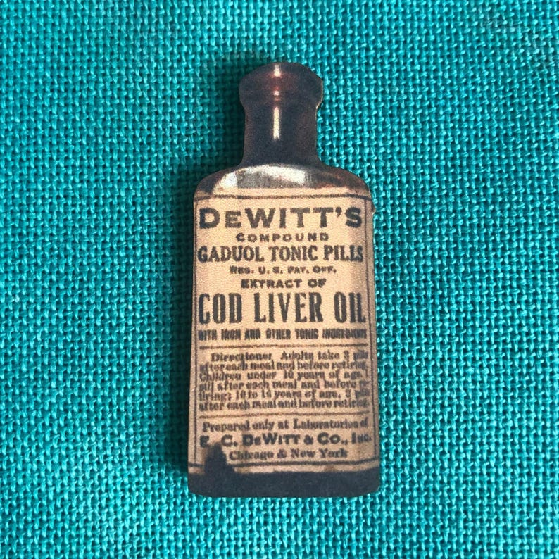 Cod Liver Oil | Wooden Needle Minder | Cover Minder Bild 1