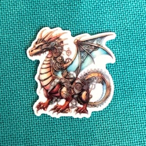 May include: A colorful sticker of a steampunk dragon with gears and cogs on its body and wings. The dragon is in a standing position with its wings spread out.