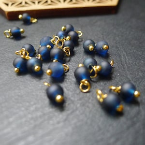 gold bell charm and matte navy blue glass bead, 4x8mm, set of 40