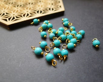 40 perles rondes pierres howlite bleu turquoise et doré 4x8mm breloques