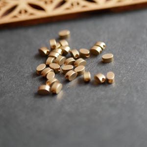 Set of 30 raw golden brass oval beads. Raw brass oval spacer beads, 5x6mm