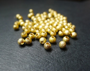 20 perles rondes doré 4mm
