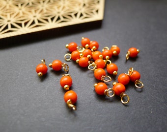 40 perles rondes pierres howlite orange et doré 4x8mm breloques