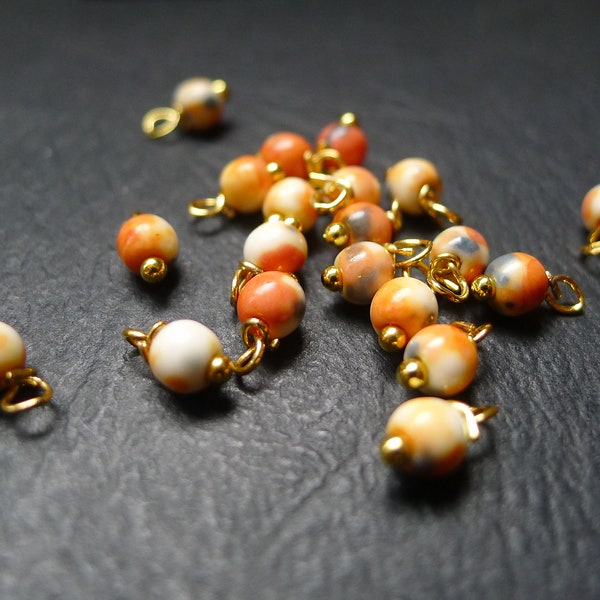 20 perles rondes en jade beige orange et doré 4x8mm