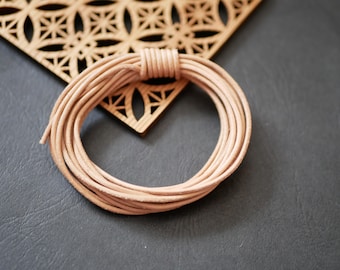 3 meters of beige leather cord, 2mm. 2mm cord for necklaces. Ideal for jewelry making, crafts, and DIY projects.