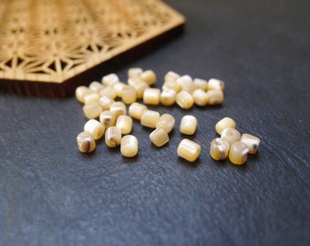10 perles ovales, coquillages blanc écru, heishi, 3,5x4mm