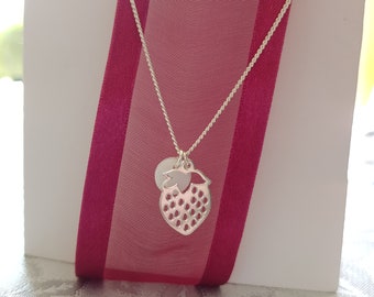 Handmade ceramic pendant.