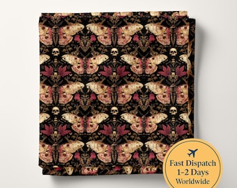 May include: A folded fabric featuring a repeating pattern on a black background. The design includes beige and pink moths, small human skulls, and dark red leaves arranged in a symmetrical layout. The fabric has a consistent, dense print.