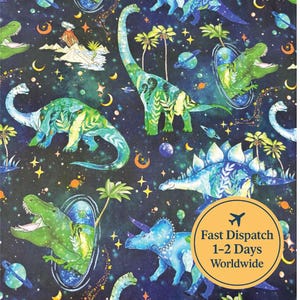 May include: A fabric pattern featuring colorful dinosaurs in a space-themed design. The dinosaurs are in shades of green and blue, with a backdrop of stars, planets, and crescent moons. The image also includes the text "Fast Dispatch 1-2 Days Worldwide".