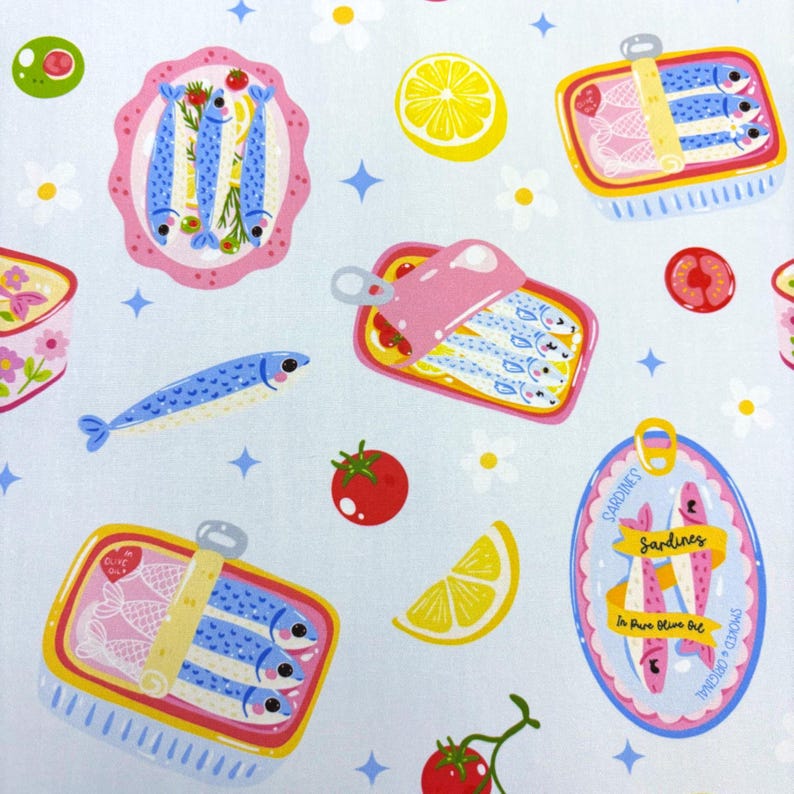 May include: A light blue fabric pattern featuring illustrations of sardines in cans and on plates, along with lemons, tomatoes, olives, and daisies. The sardines are depicted in various colorful cans, some labeled "Sardines In Pure Olive Oil".