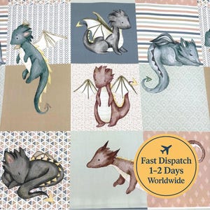 May include: A patchwork fabric with watercolour illustrations of dragons in various poses. The dragons are in shades of grey, brown, and teal, with cream-coloured wings. The background features geometric and striped patterns in neutral tones.