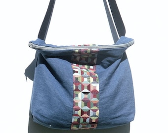 Sac à main / porté épaule / anse bandoulière / tissu / bleu jean / graphique / multicolore / toute saison .