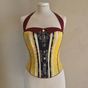 Corsetto Bustier – Raso di seta giallo blu e bordeaux. Cinghie rimovibili intorno al collo.