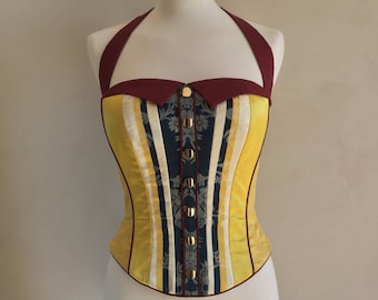 Bustier corset – Satin de soie jaune bleu et bordeaux. Bretelles amovibles tour du cou.