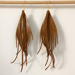 Boucles d’oreilles en plumes en cuir boucles d’oreilles en cuir plumes en cuir boucles d’oreilles plumes en cuir boucles d’oreilles en plumes beiges boucles d’oreilles légères