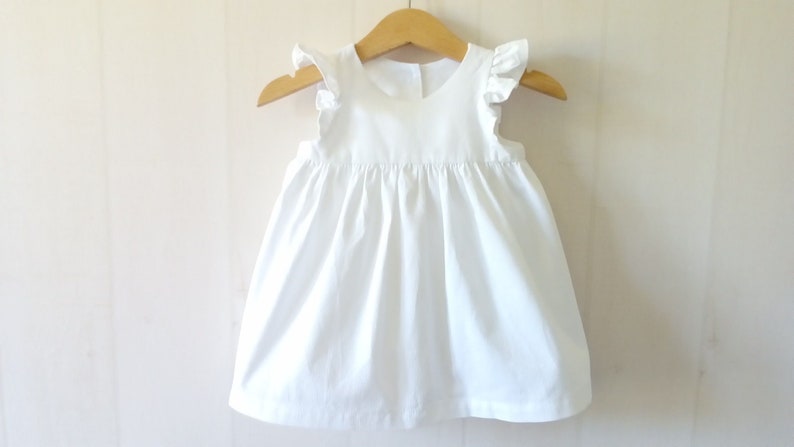 white cotton baby dress