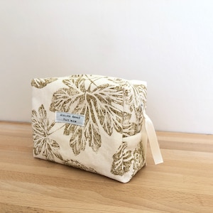Ecru and gold “plant” printed cotton linen toiletry bag lined with fleece and ecru water-repellent canvas