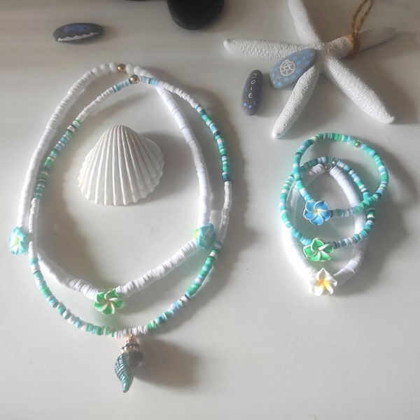 beach necklace white pearls and blue green tones shell or Hawaiian flowers