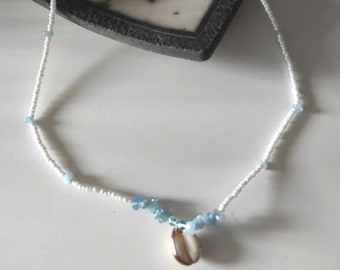 Cowrie shell necklace with aquamarine beads and white glass beads