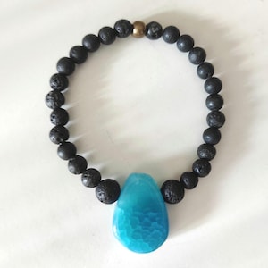 pulseira de contas de pedra de lava e ágata azul