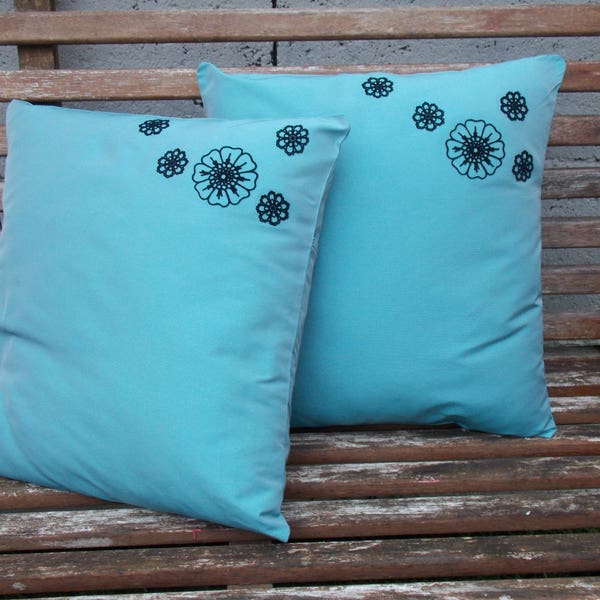 Lot de 2 housses de coussin turquoise motif fleur