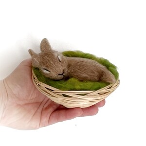 Sleeping felted bunny with basket, cute handmade waldorf hare sculpture.