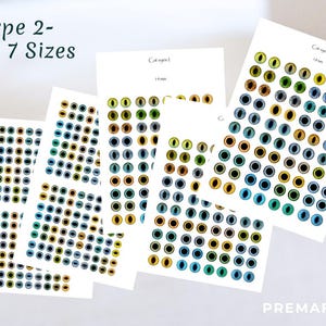 The image shows a depicting different cat eyes template pattern for needle felting depicting  in front of a white room interior.