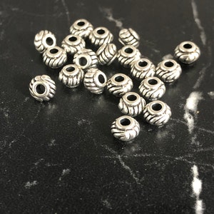 10 antique silver spacer beads 39AS
