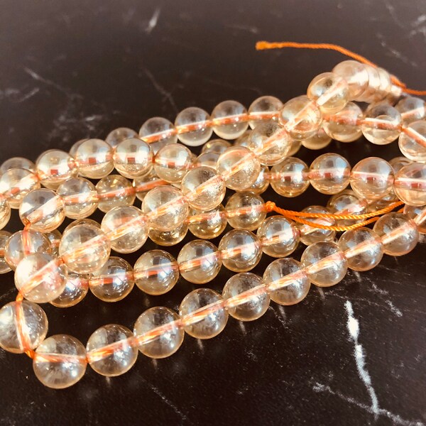 Aqua aura perles de 8 et 10mm jaune