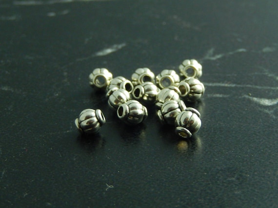 Lot De 20 Perles Intercalaires En Argent Tibétain - Diamètre 7 Mm - Couleur Doré - Neuf (origine Chine)