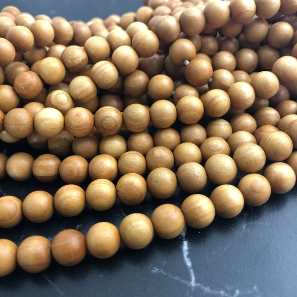 50/100  Perles ronde  bois  6,8 ET 10 mm